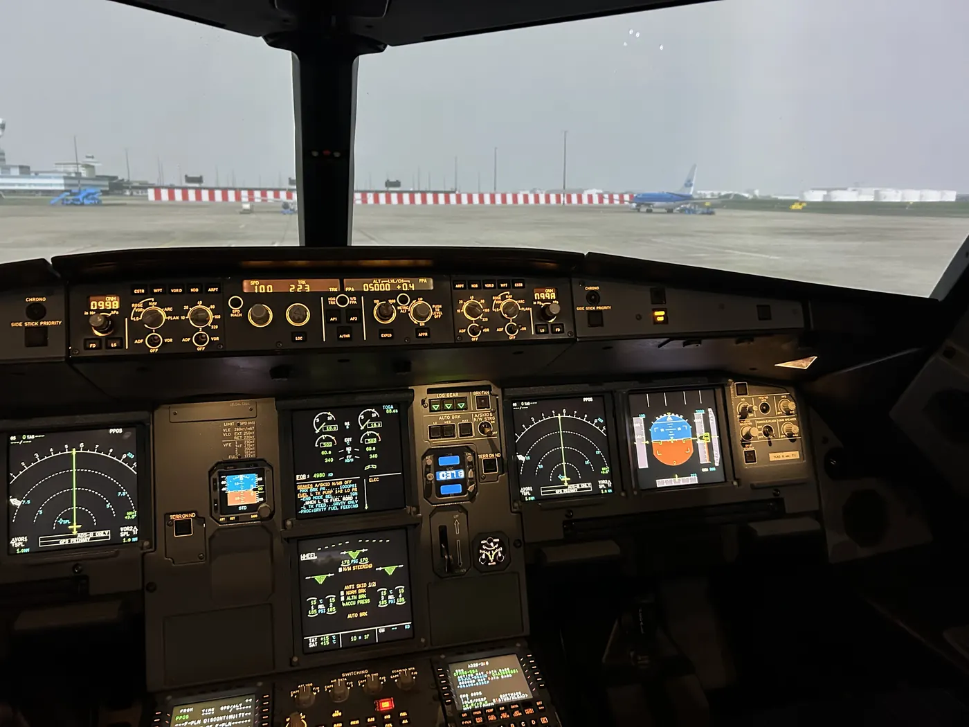 Airbus A320 simulator flight deck with visual scene